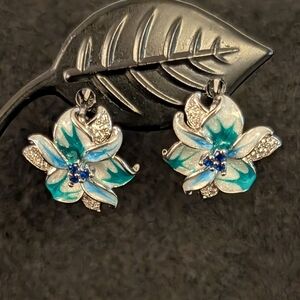 LILIES IN BLOOM WITH CRYSTALS. PIERCED. HUGGIE EARRINGS.